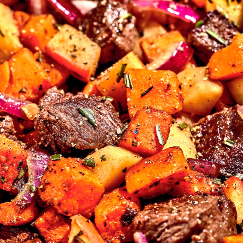 Close-up of roasted vegetables and meat dish